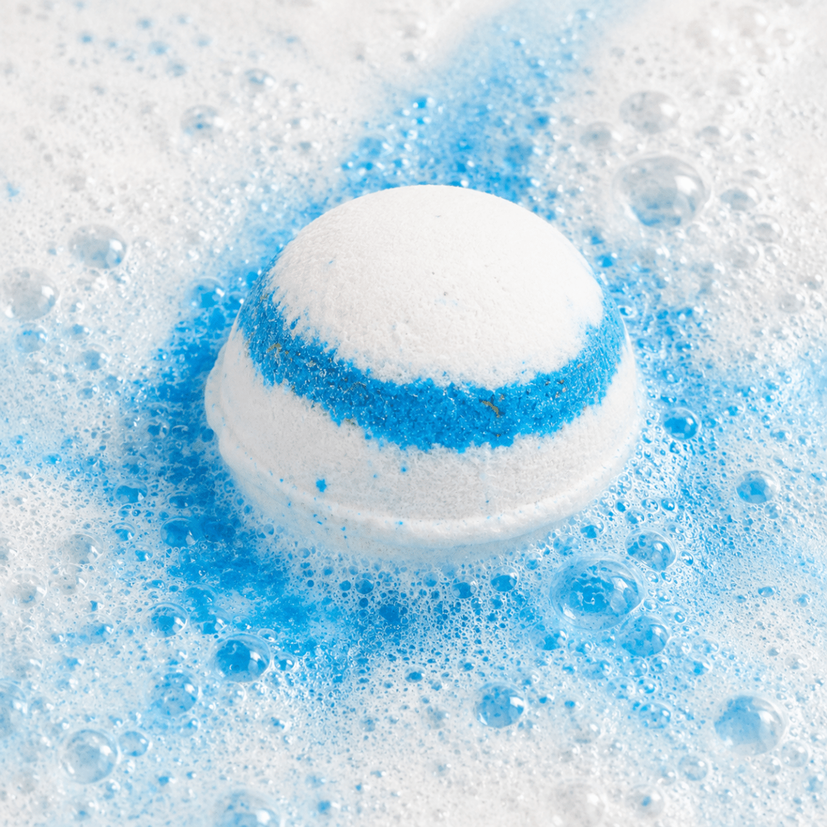 Calm Waters Sea Bath Bomb fizzing in water by Bath Box