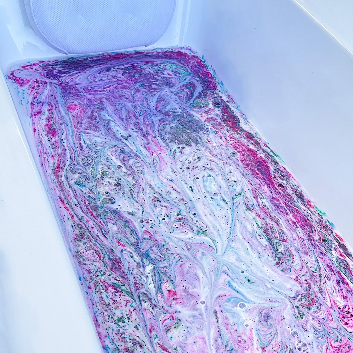 Amethyst bath dust, swirling colour through the bath water