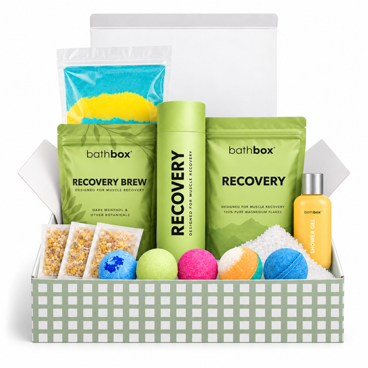 Recovery Gift Box in a sage gingham gift box with bath bombs, brew, salts, shower gel and bath dust