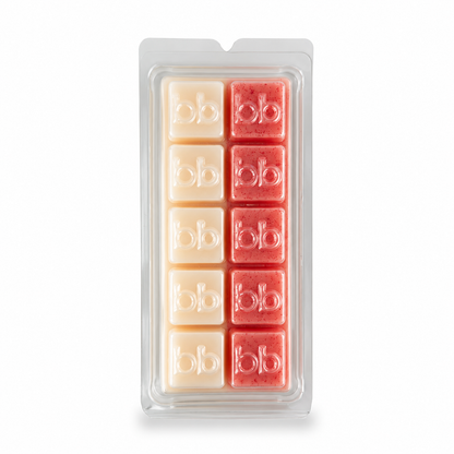 Candy Cane Lane peppermint soy wax melts in a clear clamshell pack, pale pink and red cubes embossed with the Bath Box logo
