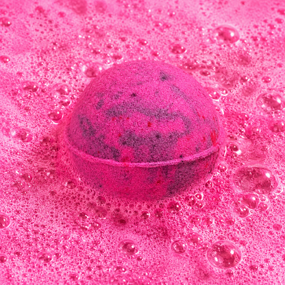 Cozy Nights Camellia Lotus Bath Bomb fizzing in water by Bath Box