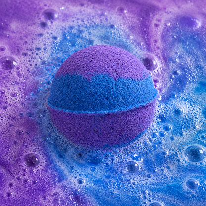 Deep Sleep Honey Lavender Bath Bomb fizzing in water by Bath Box