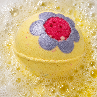 Night Bloom White Tea Bath Bomb fizzing in water by Bath Box